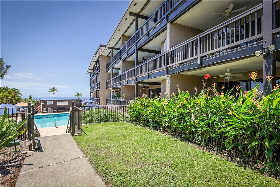 Your garden unit to the right, you can see your kids in the pool from your patio, yet hidden away behind birds of paradise!