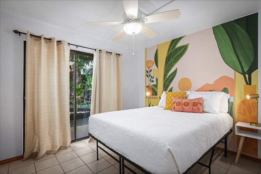 Queen size memory foam mattress in 2nd bedroom featuring mural wall! Private exit out step free pathway to street.