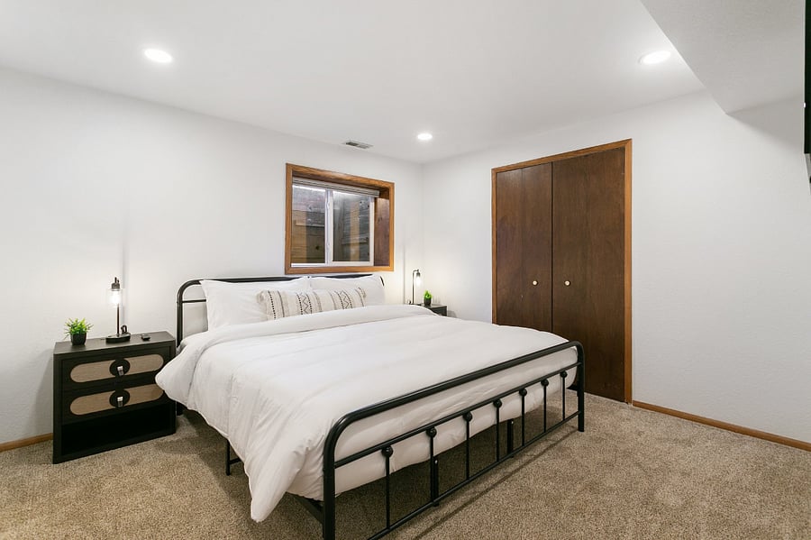 4th Bedroom Downstairs with King Size Bed, Smart TV, plenty of closet space, next to Work Station and Sauna. 