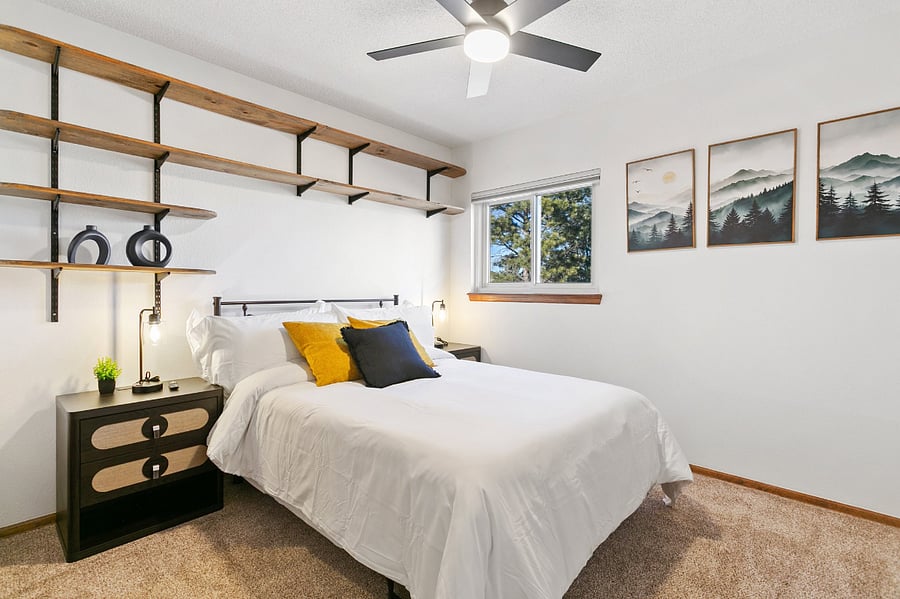 3rd Upstairs Bedroom with Full Size Bed, Smart TV, plenty of closet space, and shared hallway bathroom. 