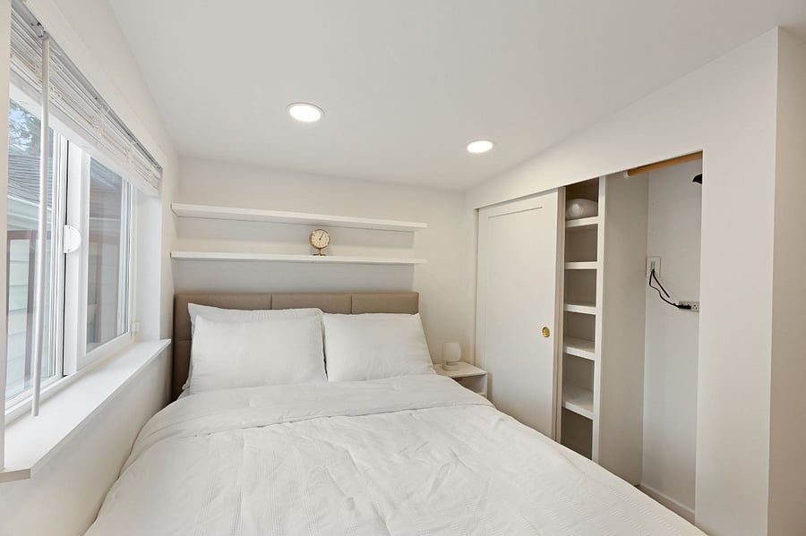 Second bedroom includes a vacuum cleaner (not shown in picture).