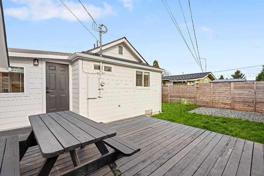 Backyard is fully fenced with a deck and a BBQ grill (not shown in picture).