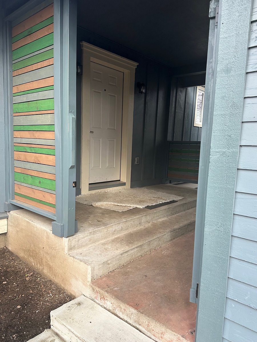 Gate opens and this is the entrance to the house and the garage which has power for those electric bikes or extra stuff!