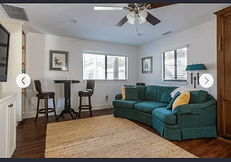Living room with the Murphy bed in it.Fir