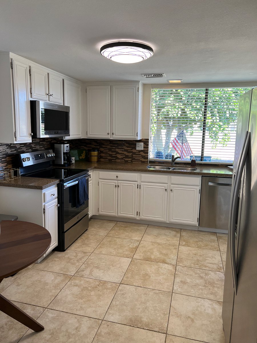 Remodeled, fully furnished & spacious kitchen with golf course views.