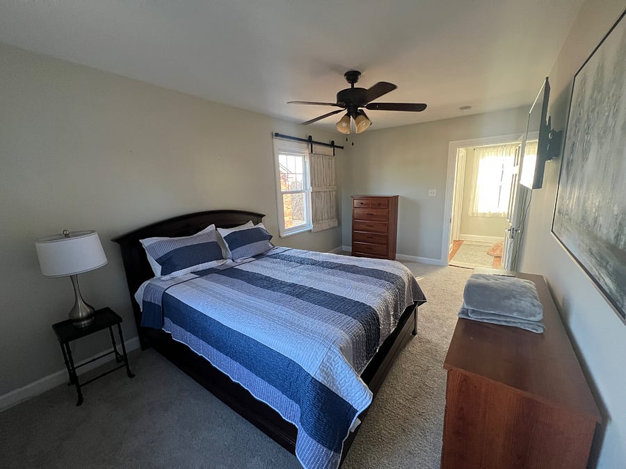 Bedrooms 1 with closet and tv