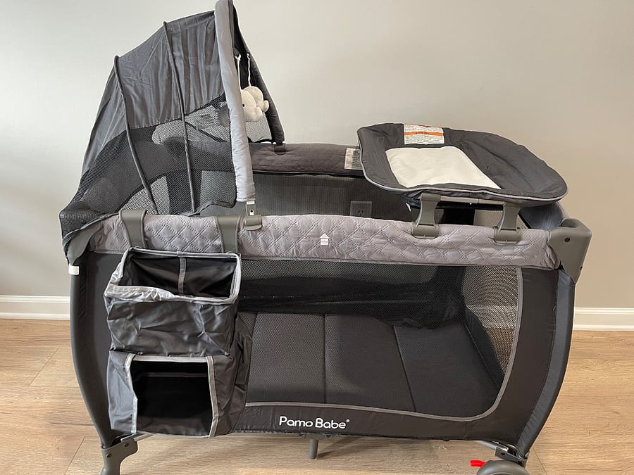 pack and play crib. this is in the upstairs closet. Easy to assemble and snaps into place. Please put away when done with it.