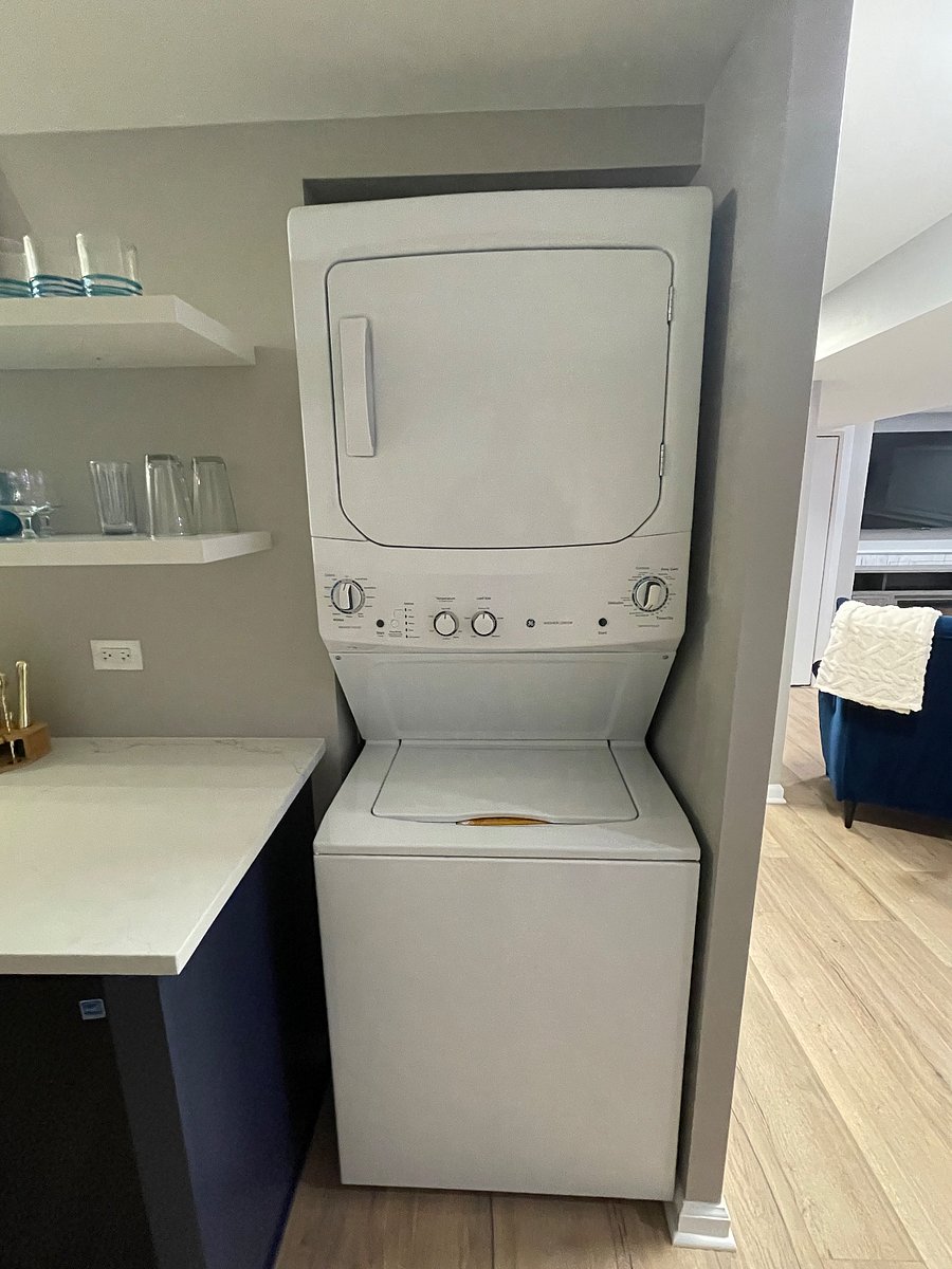 Brand new stackable washer and dryer.