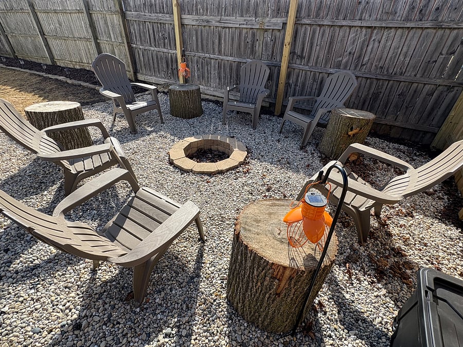Firepit. One bundle of wood is supplied. Stumps can be tables or used as extra seating. Matches in kitchen drawer.