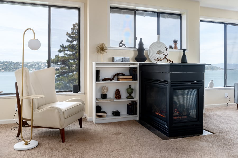 Cozy 3 sided gas fireplace.