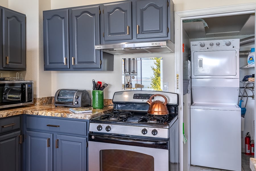 Washer and gas dryer convenient to kitchen.