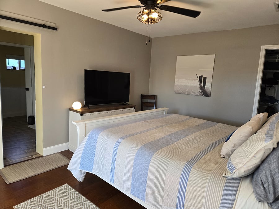 Master Bedroom with TV and ensuite bathroom
