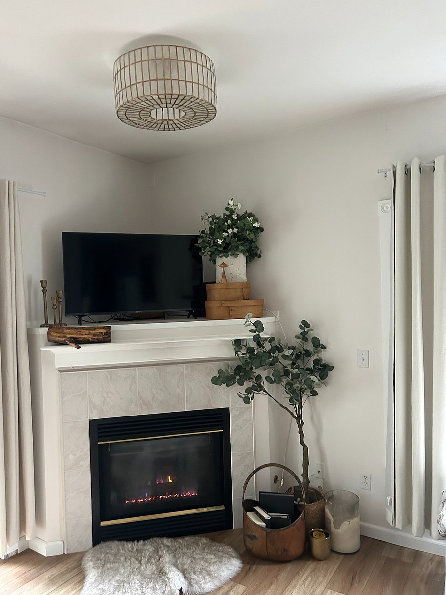 Living room fireplace- heats the whole condo in just a flip of a switch!