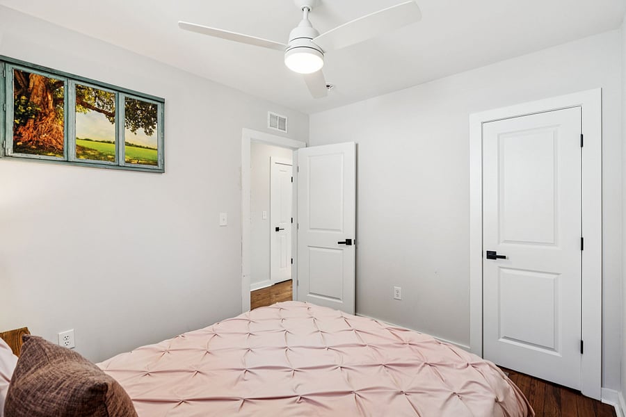 bedroom 2. queen bed. closet