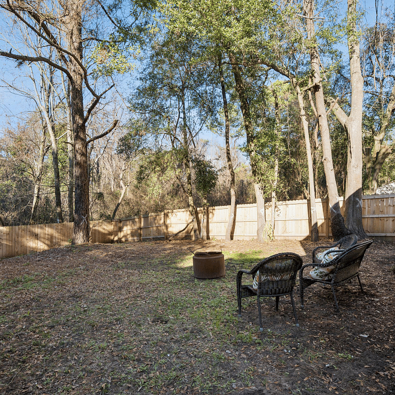 fenced in back yard. backs up to small brook