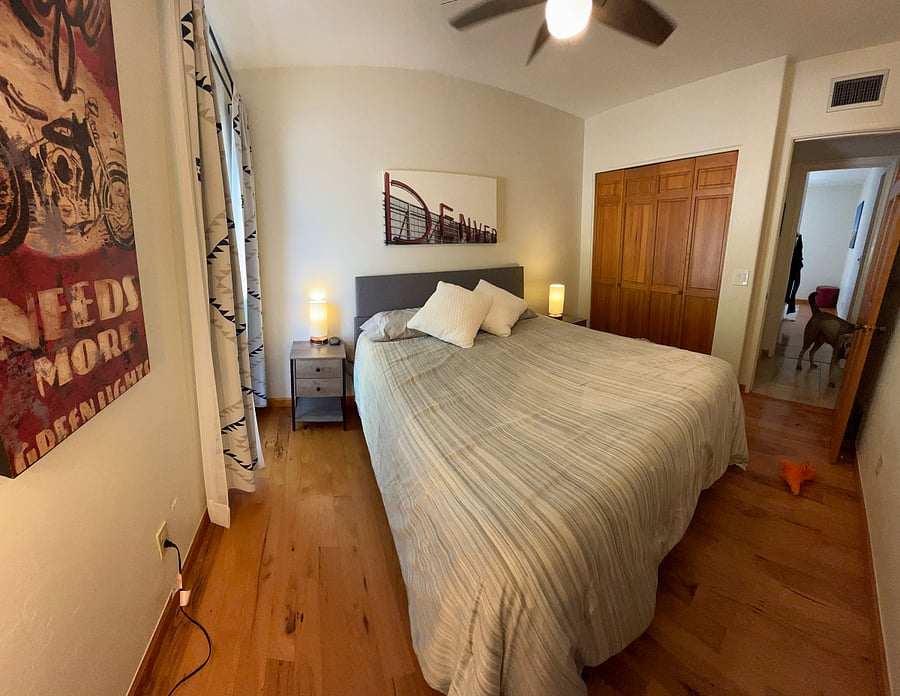 Bedroom with queen Beautyrest mattress and large closet