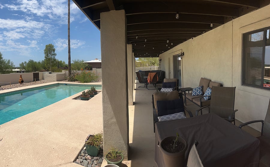 Backyard private pool and covered deck