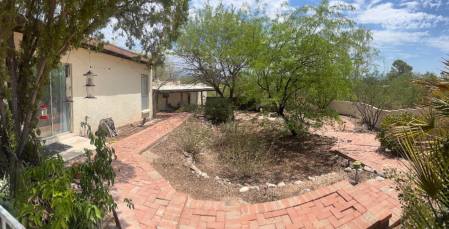 Shared backyard with casita.