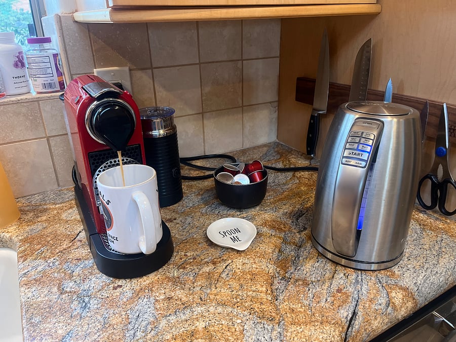 Coffee station with Nespresso and hot water kettle.