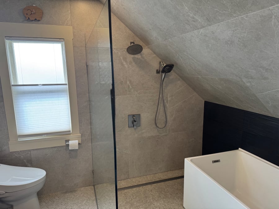 Full bath wet room with shower and soaking tub with heated flooring, heated toilet with bidet