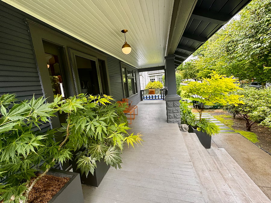 Front porch with seating and porch swing