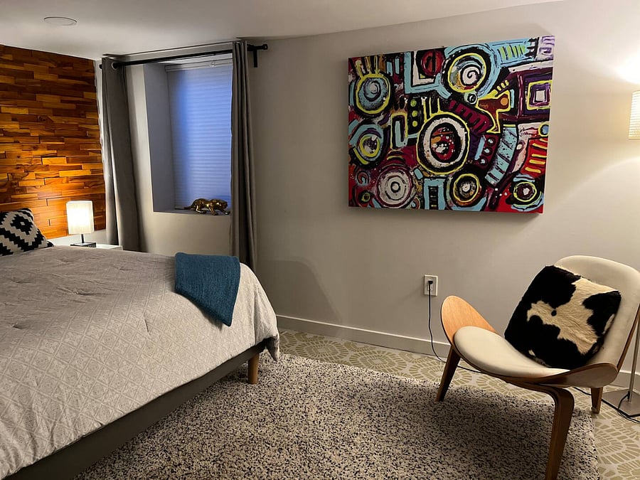 Queen bed in the lower level bedroom