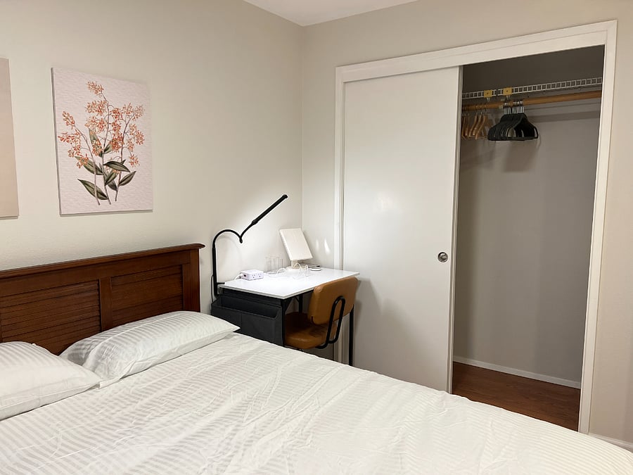 Bedroom 1 - Work desk / vanity and office chair and large closets