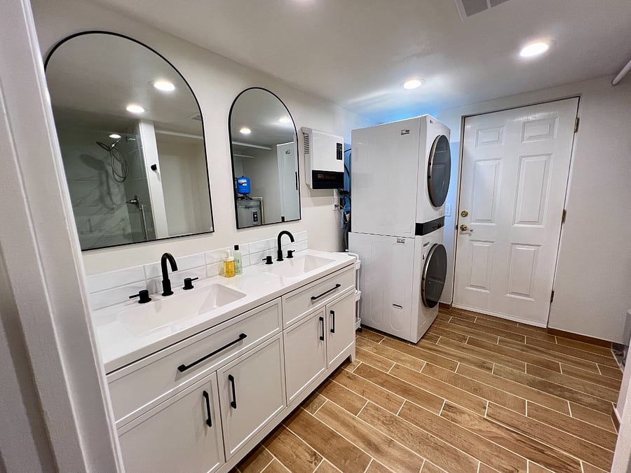 Fully renovated bathroom with double sinks, and your own separate in-unit washer & dryer