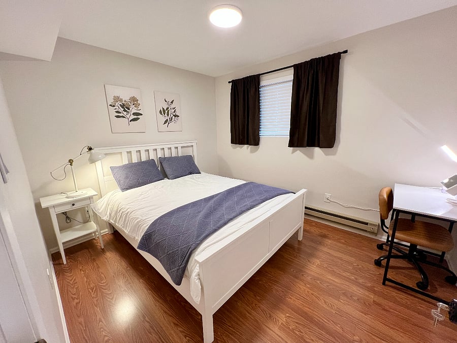 Bedroom 2 - Queen size bed and blackout curtains and blinds