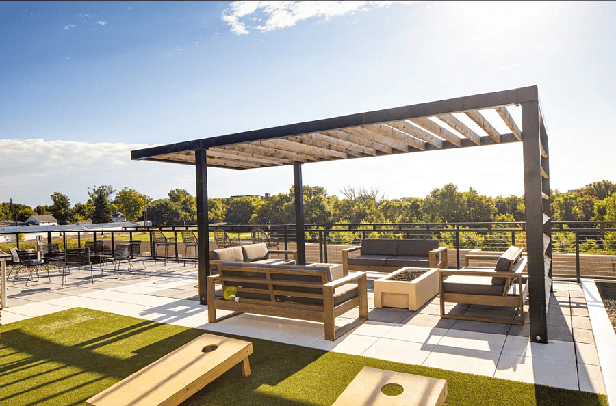 Rooftop patio with grills, fire-pits, and lounge area