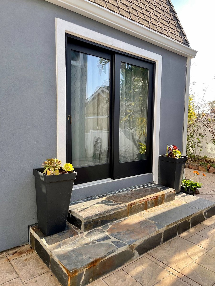 Court Yard and also sliding door to Double Bedroom