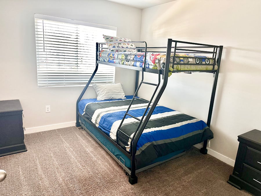 New twin over full bunk bed with trundle still underneath