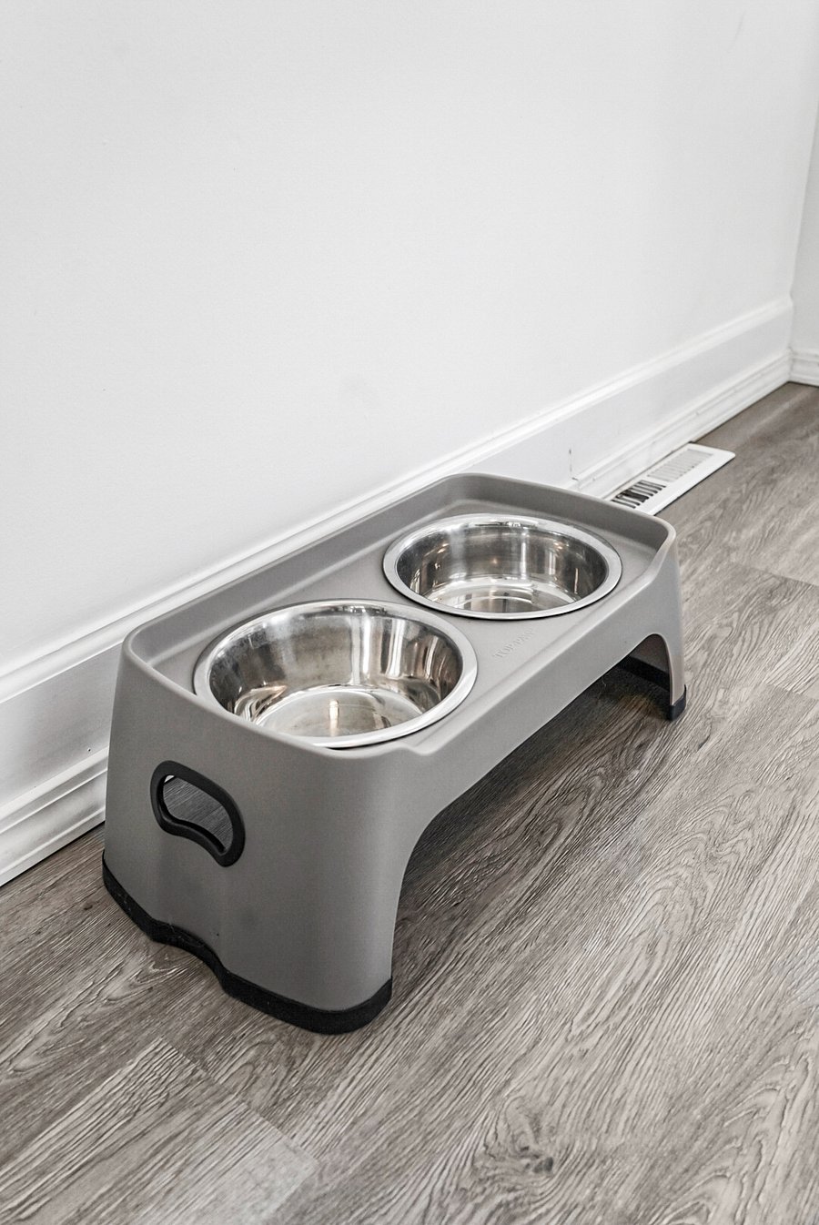 A pet-friendly retreat! Your furry companion will feel right at home with a dedicated food and water station, ensuring a comfortable and welcoming stay. 