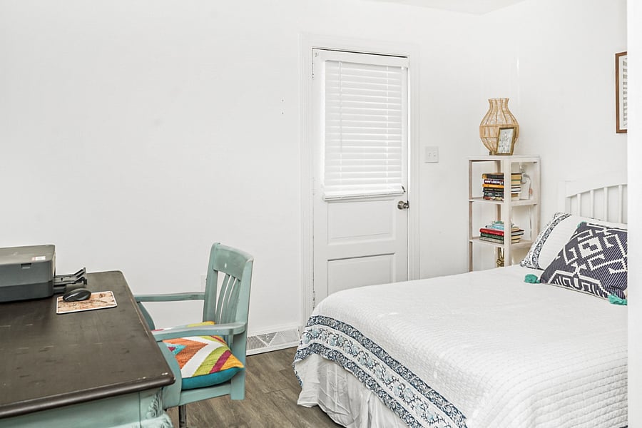 A cosy and versatile retreat! This bedroom offers a comfortable bed, a dedicated workspace with an office table, and a peaceful atmosphereperfect for both productivity and relaxation. 