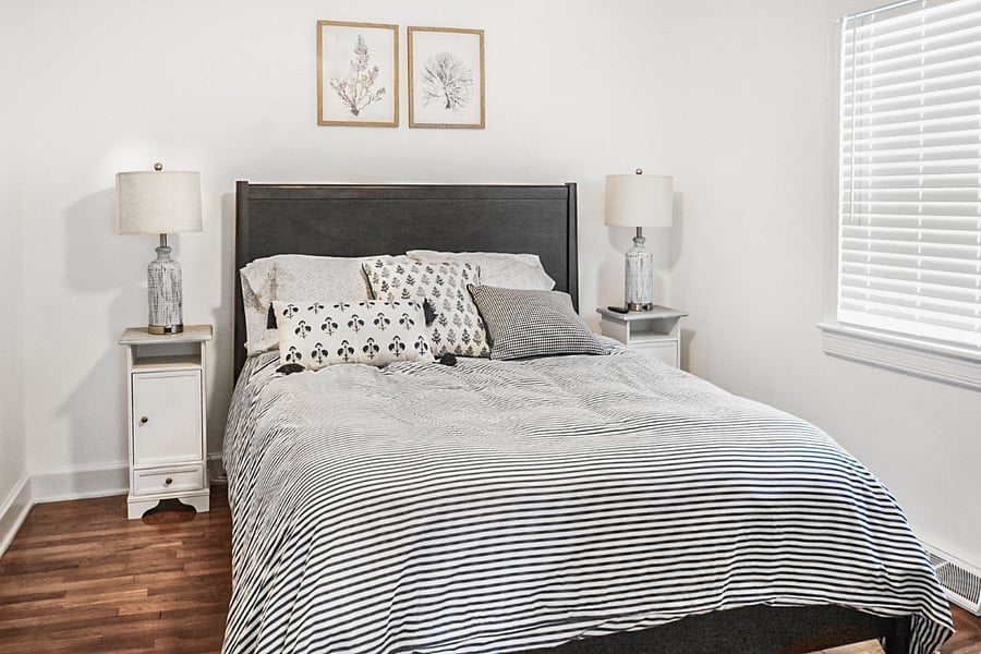 A serene and stylish escape! This bedroom offers a plush bed, cosy linens, and gentle lighting, creating the perfect space to unwind and enjoy a restful night. 
