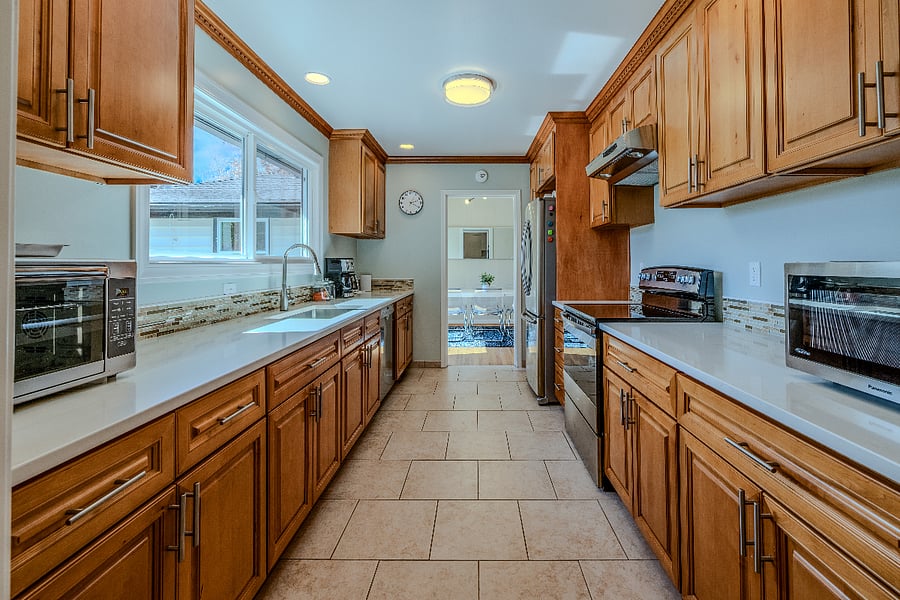 Spacious and functional kitchen leads to dining room