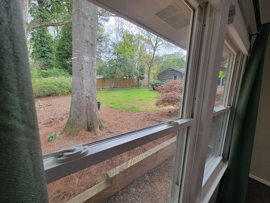 View from Dining Room windows overlooking owners back yard.