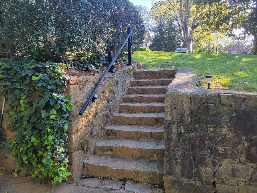Steps leading from driveway to entrance