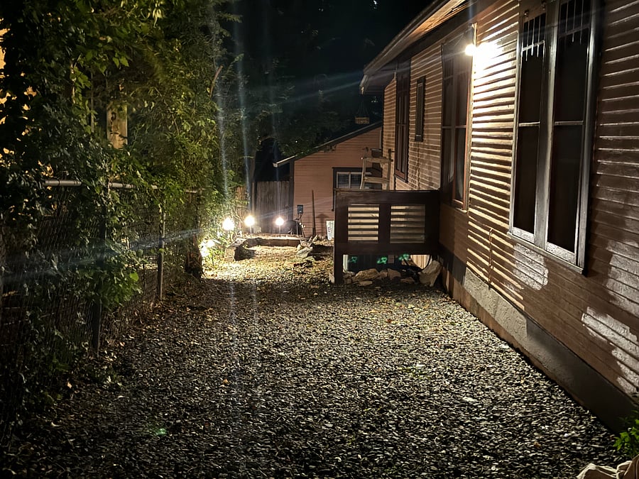 Lighting along path from parking spot to front door.