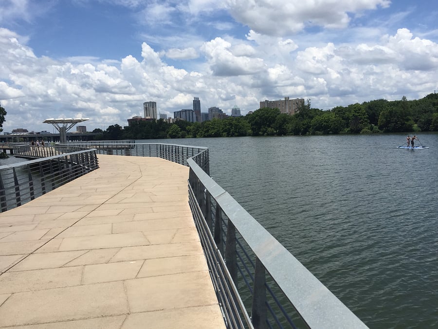This portion of the Town Lake Trail, now called the Lady Bird Trail, was built recently to close the gap between south east section and the north side of the lake. The entire route is about 8 miles around and takes you straight into downtown with trails the lead further north. This trail system links to the Stacy Park trail across the street from the house.