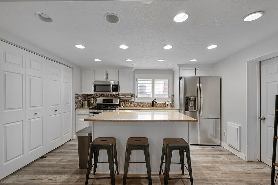 Full kitchen that flows into open area for dining and family room. LG appliances: Gas oven/range, microwave, refrigerator/freezer with ice maker and water. Kitchen has all the basic needs and some extras! Pots/pans, dishes, baking pans, kitchen aid mixer, utensils, plates, bowls. If there is anything you need not listed just let us know.