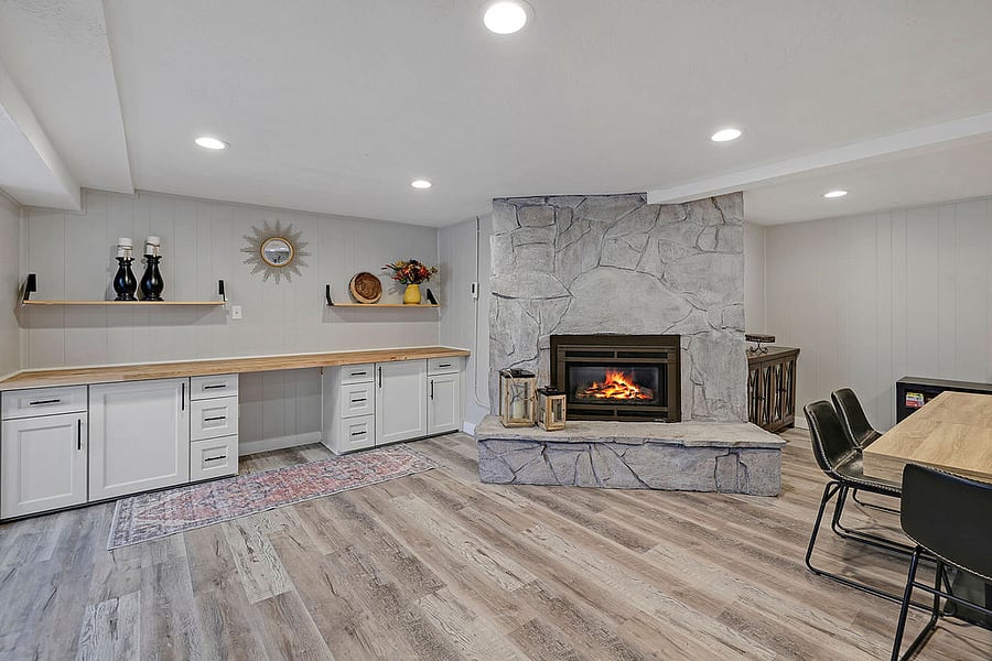 Empty cabinet space to store any personal dining items you may have. This area connects with the kitchen and the family room area. Gas fireplace with Electric tea pot, coffee cups and starter coffee pods and ground coffee.