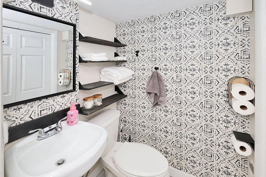 Private half bath attached to bedroom 1. Sink/toilet. Some starter hygiene supplies, towels, soap provided.