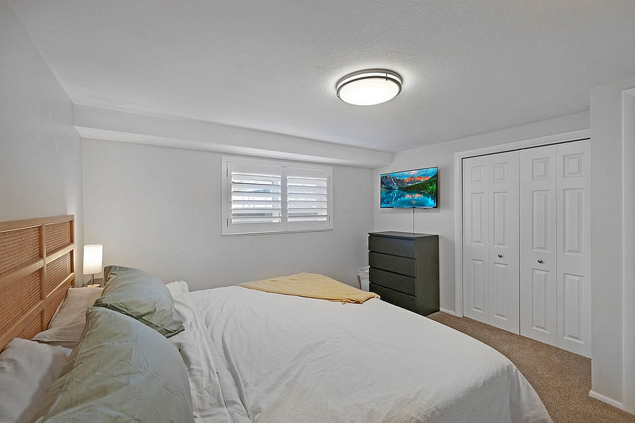 Bedroom # 2-King Bed, Smart TV, Closet space with shelf, hangers, fan, heater, extra blanket. 4 drawer dresser. Large window that allows much light if desired. Plantation shutters that block light when needed to be darker. Dimmable lamps with charging stations for phones.