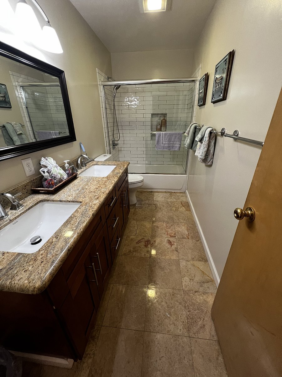 Bathroom #1, double sink and bathtub