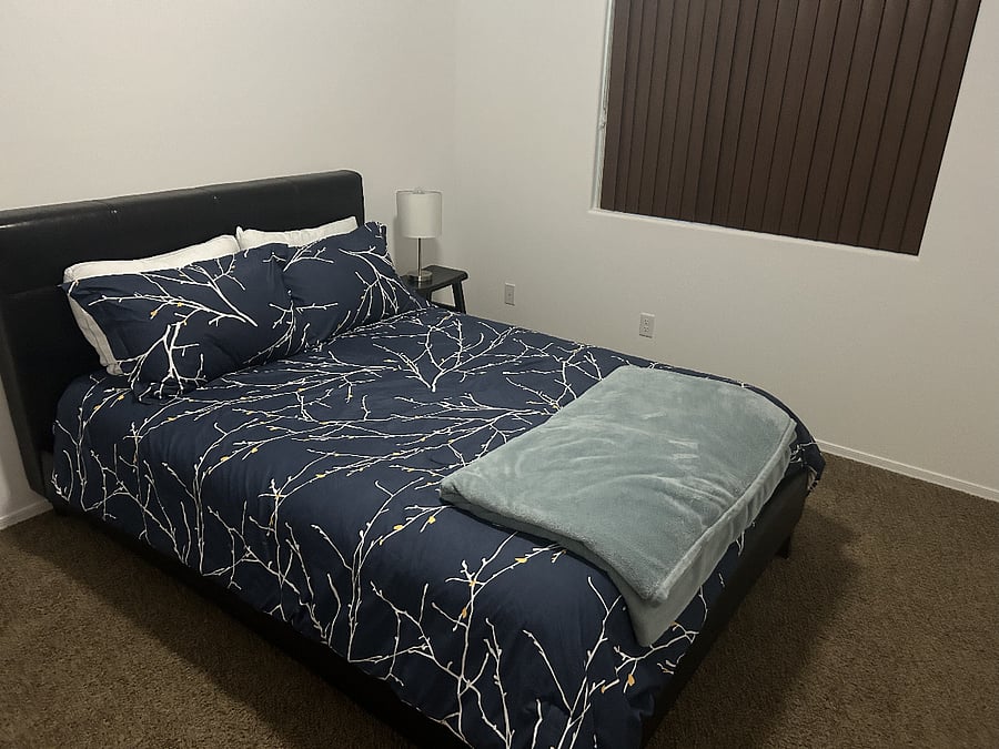 2nd Bedroom (Queen) with full closet and convenient private access to second bath.