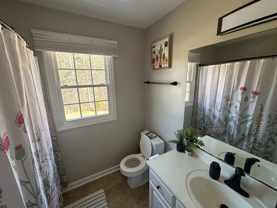 Private backyard with no view from the neighbors so I usually keep the window open with the blinds pushed up. Nightlight is available in the bathroom