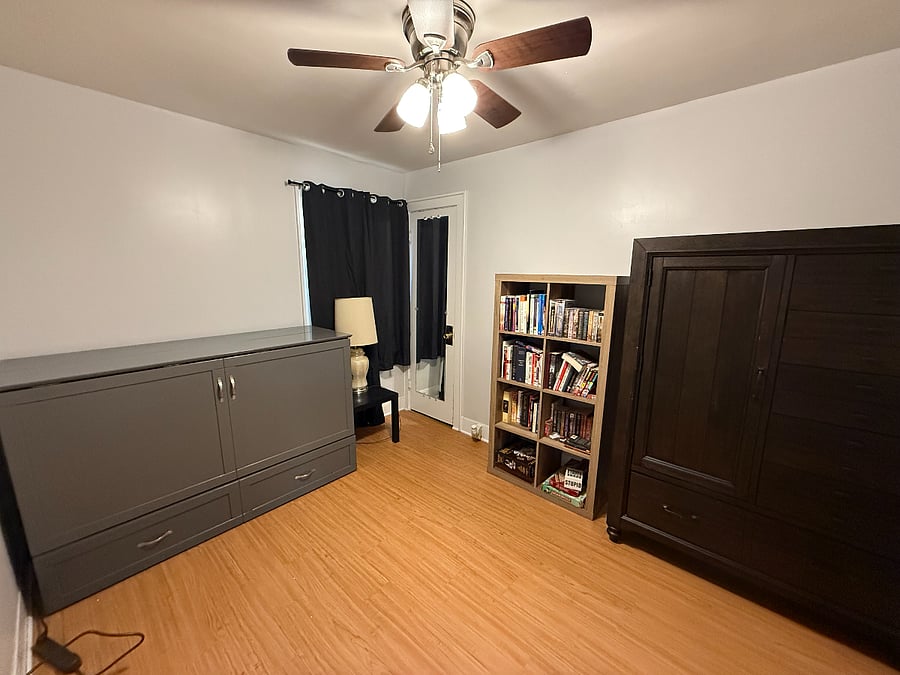 Bedroom 2 with bed put away