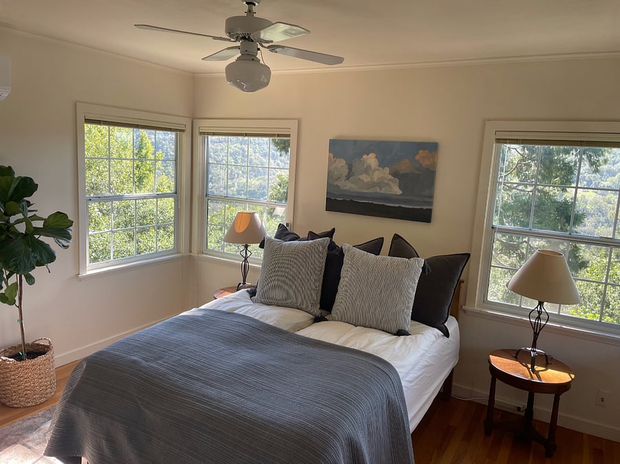 Front Bedroom - glimpse of the river to the east, and wonderful, bright views from all windows. New mini-split with remote installed.