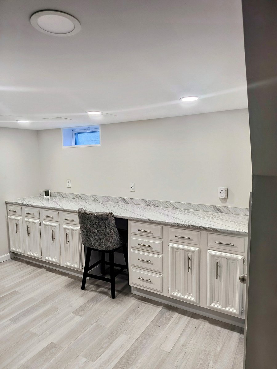 Dedicated work area in laundry room with 12 foot counter